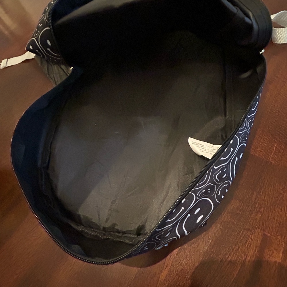 Black And White Patterned Backpack With Smiley Fa… - image 5